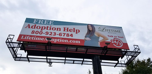 Lifetime Adoption's billboard on US-19