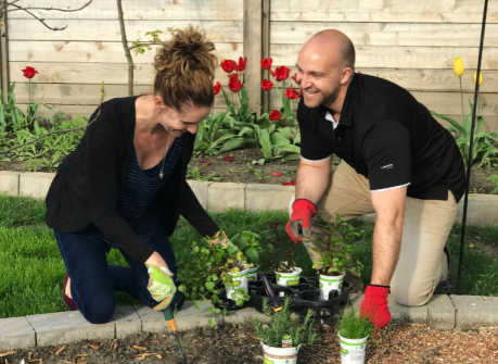 Eric and Danyelle adding new plants to their garden