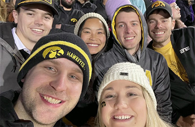 Nick and Ashley enjoying a Hawkeyes game with friends