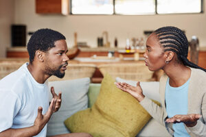 A young couple having a disagreement at home